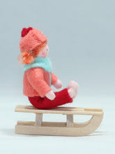 Kid Doll on Sleigh – 2.5" Handmade Felt Waldorf Doll by Ambrosius