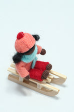 Kid Doll on Sleigh – 2.5" Handmade Felt Waldorf Doll by Ambrosius
