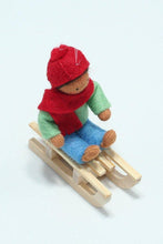 Kid Doll on Sleigh – 2.5" Handmade Felt Waldorf Doll by Ambrosius